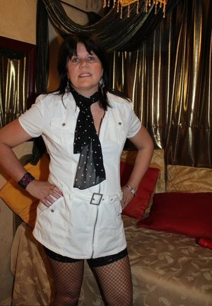 Leggy brunette solo girl in high heels revealing big tits and nice ass